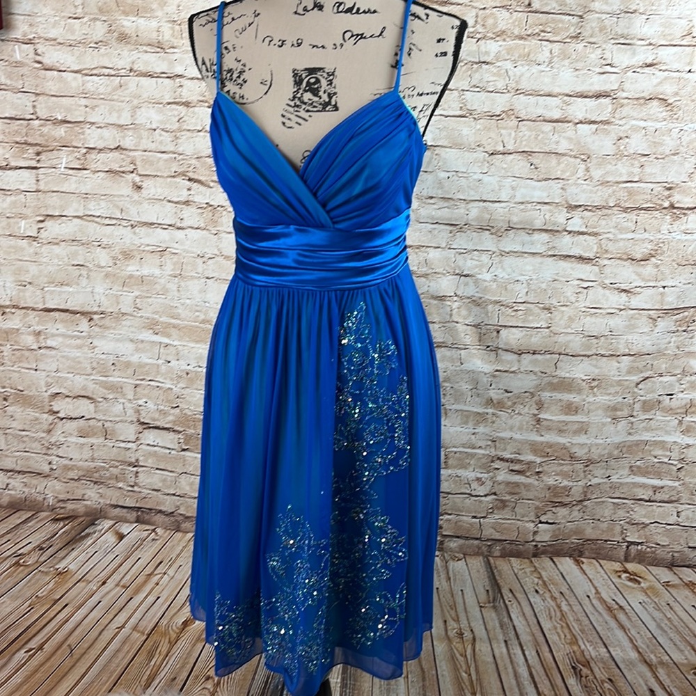 Jodi Kristopher Blue Prom Dress with Silver Accents